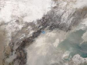 Smog as seen from space. Blue circle is Beijing. Photo credit: NASA