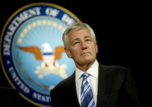 Defense_Secretary_Chuck_Hagel_stand_during_the_playing_of_the_service_melodies_after_a_welcoming_and_swearing_in_ceremony_at_the_Pentagon-470x330