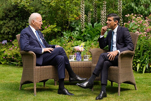 President Joe Biden and Prime Minister Rishi Sunak meet in a courtyard
