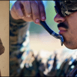 GEN Ulysses S Grant with a full beard opposite US Marine using a dry razor to shave while wearing a ballistic helmet and in a field training environment.